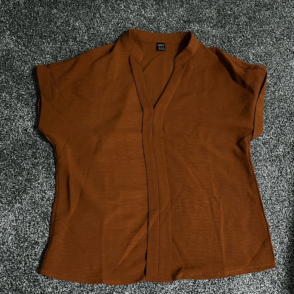 Cute rust/burnt  orange colored blouse! Worn once excellent condition